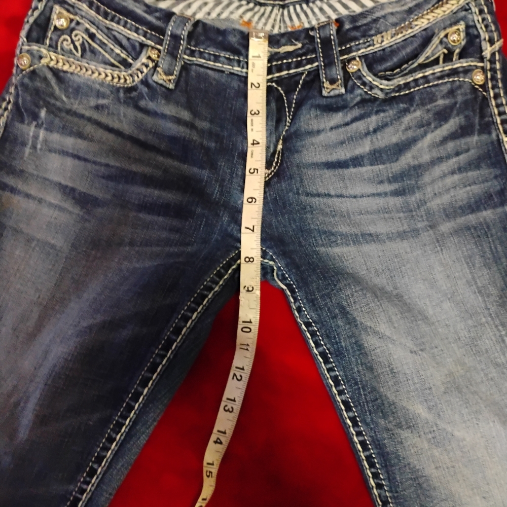 Rock Revival Blue Jeans with Contrast Stitching and Worn-In Look